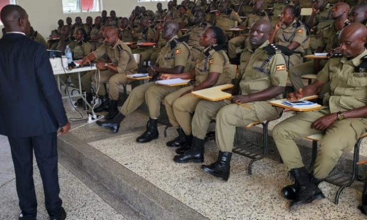 Mr. David Ngobi-Mgr.Compliance and Inspection training the 163 Senior Police Officers at Kabalye- Masindi