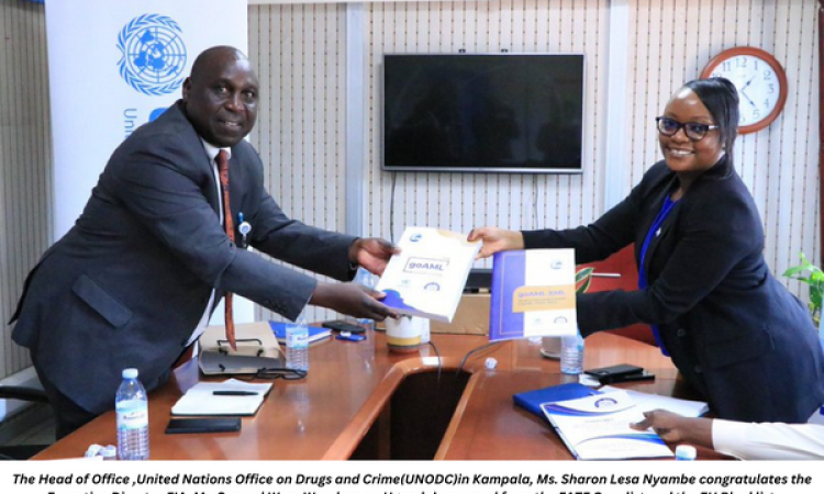 The Head of Office, United Nations Office on Drugs and Crime(UNODC)in Kampala, Ms. Sharon Lesa Nyambe congratulates the Executive Director FIA, Mr. Samuel Were Wandera on Uganda’s removal from the FATF Grey list and the EU Blacklist.